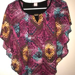 Light top with black tank under